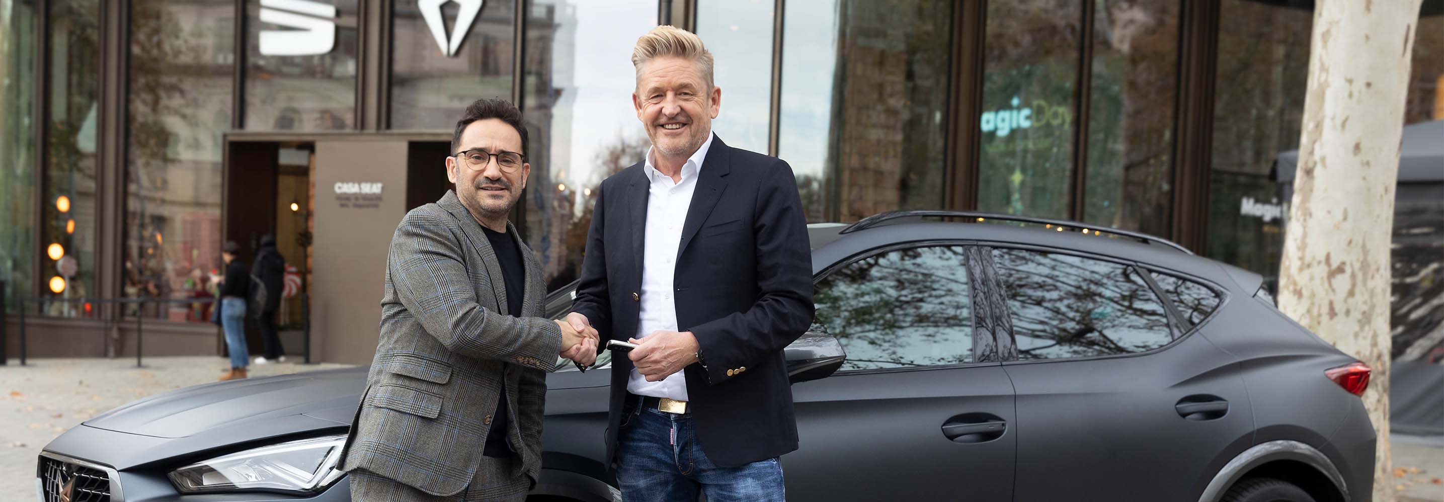 Juan Antonio Bayona posing as the new CUPRA brand ambassador with CUPRA's CEO Wayne Griffiths 