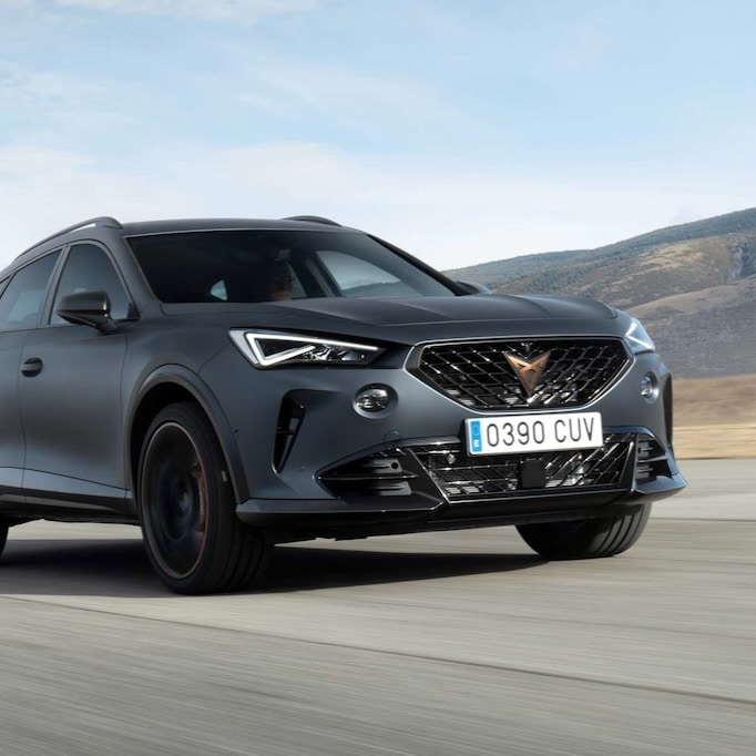 A Magnetic Tech Matte CUPRA Formentor driving through the highway