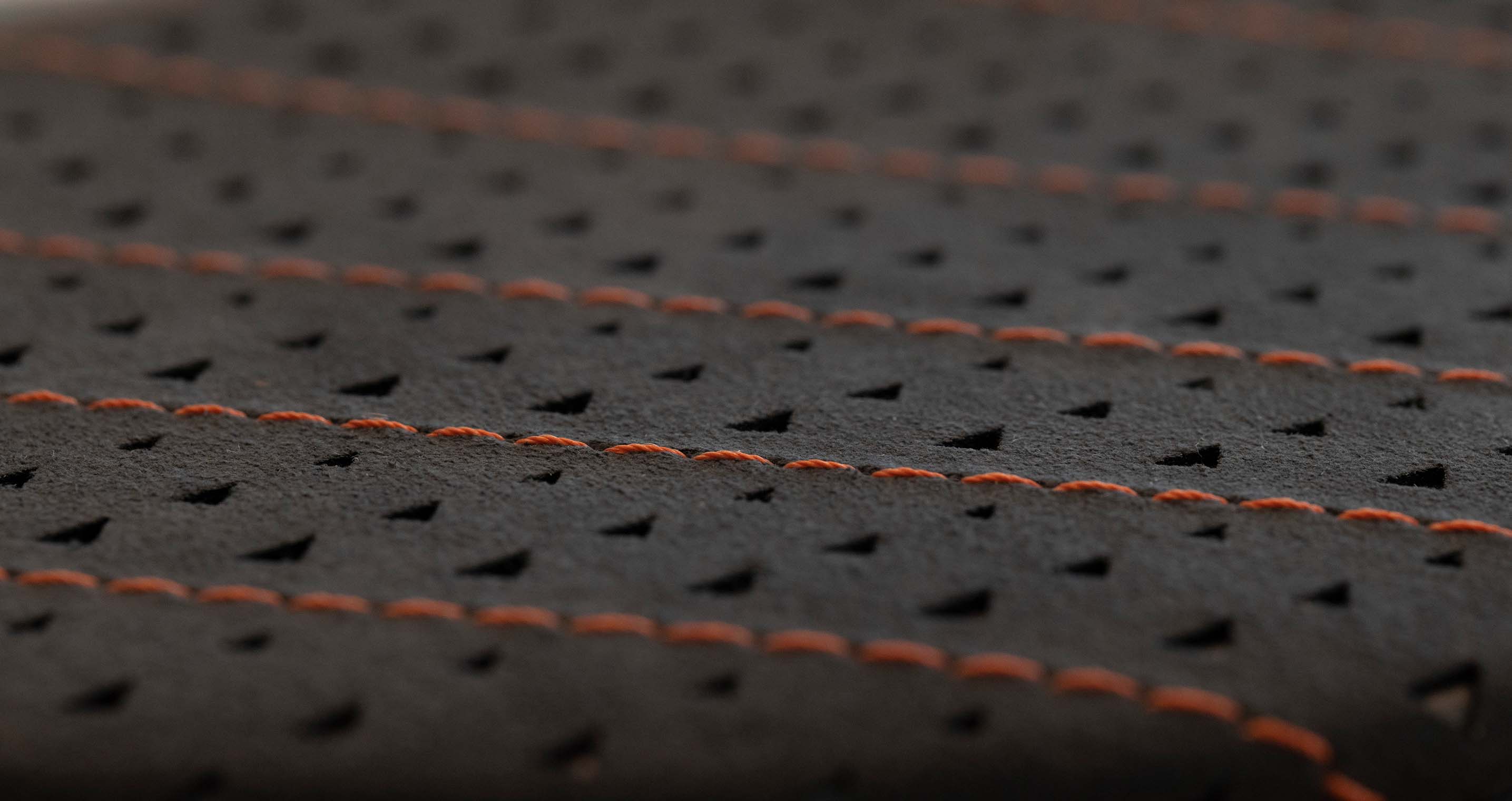 Copper-coloured CUPRA stitching and CUPRA logo perforations for the new Tavascan interior.