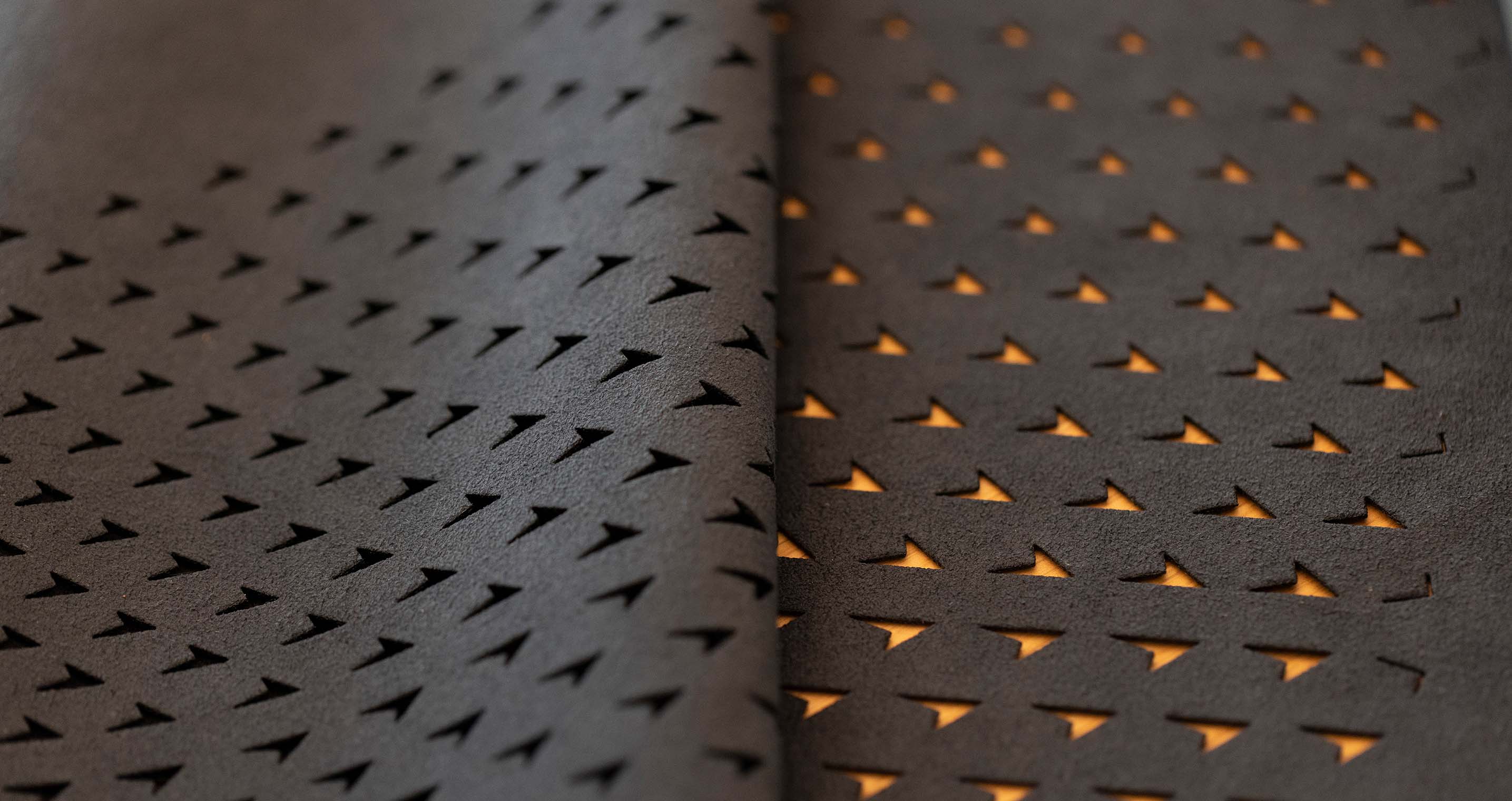 Close up of CUPRA copper perforations designed for the new CUPRA Tavascan vehicle.