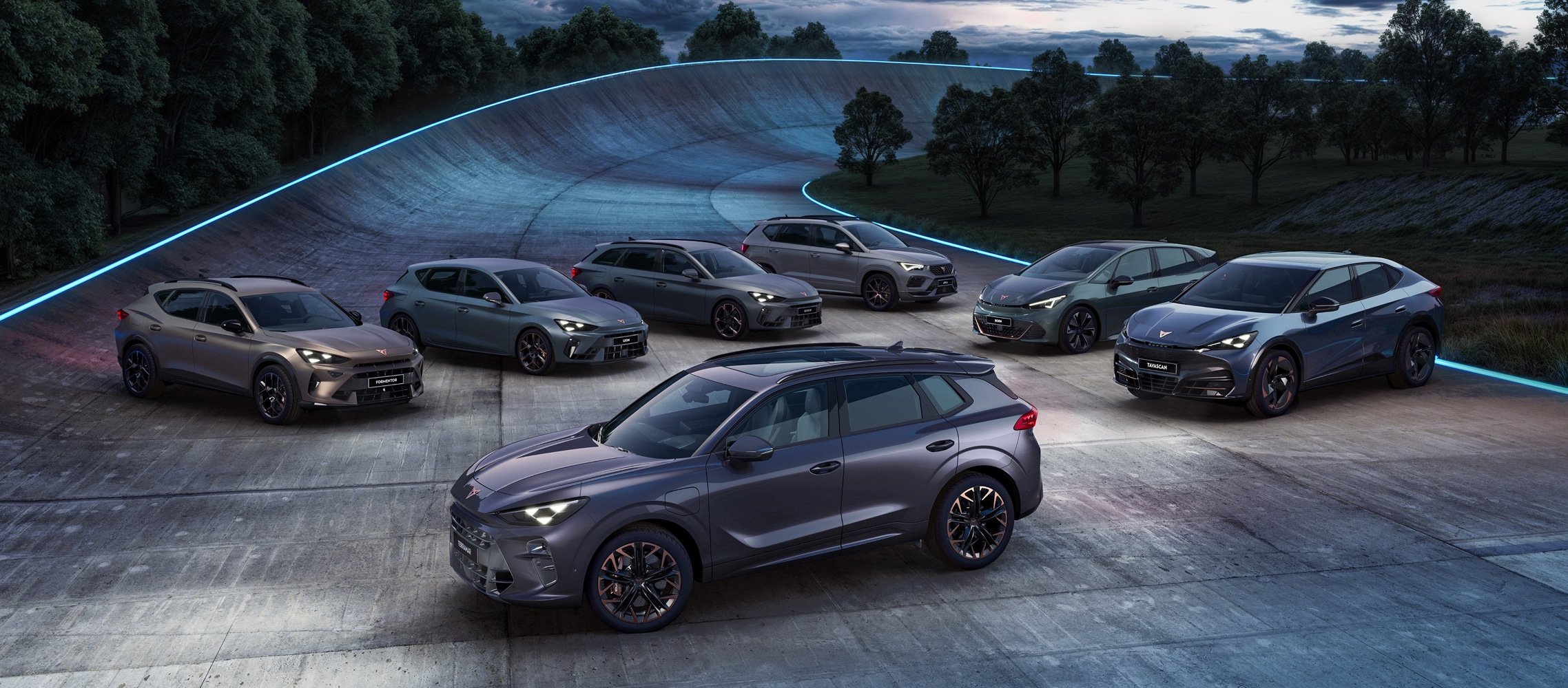 A lineup of seven dark-colored CUPRA vehicles (SUVs, crossovers, and wagons) parked on a stylized, banked, concrete road that curves into the background. The scene is set at dusk or night with trees and a dramatic sky.