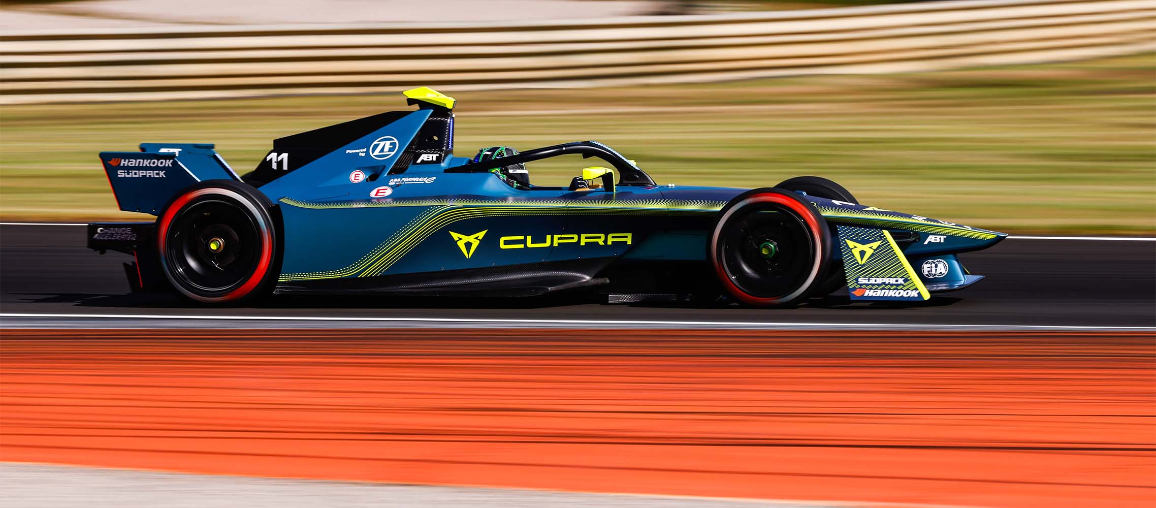 side shot of cupra electric race car in motion