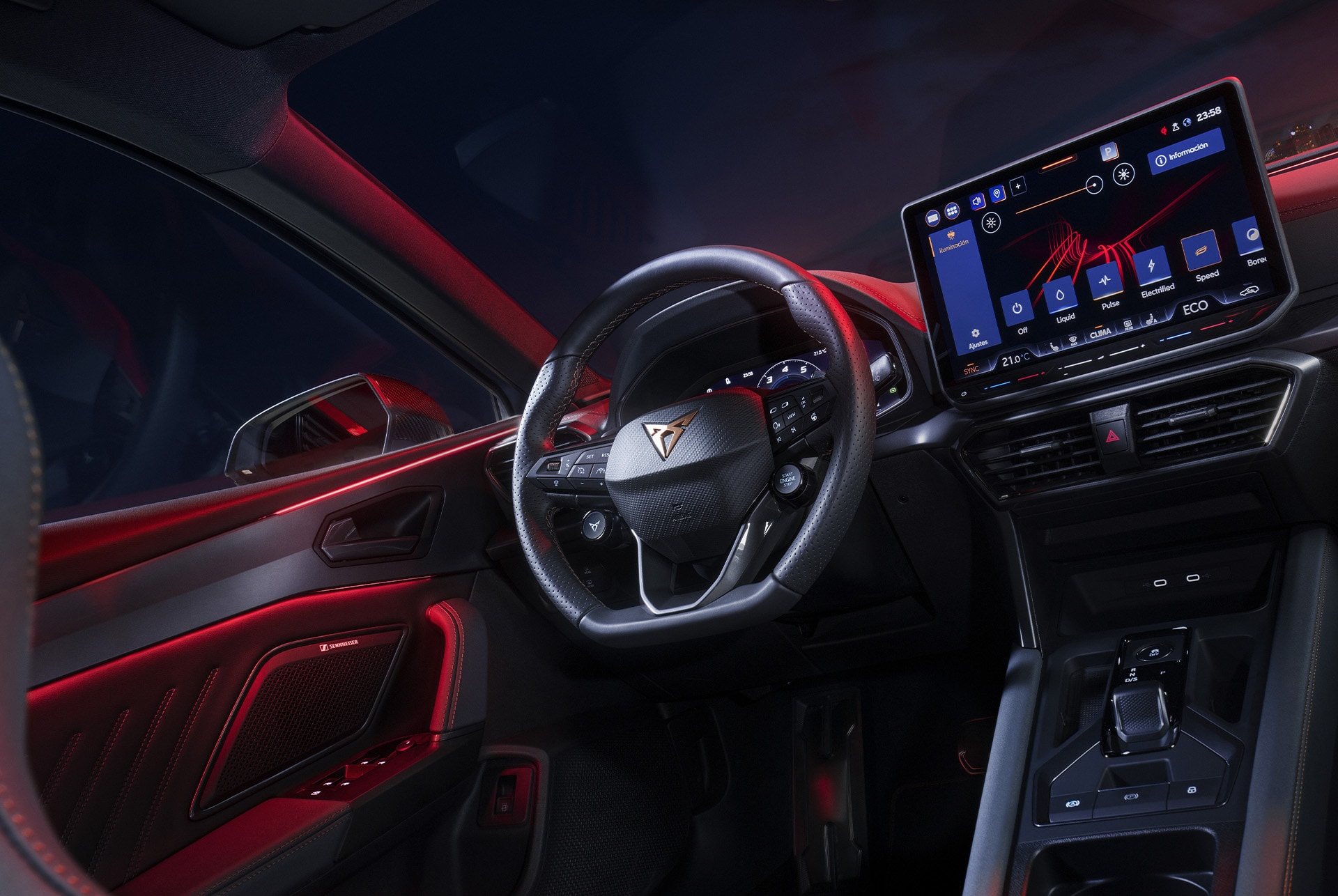 Front view of the Cupra Leon hybrid car advanced steering and dynamic chassis control in action, blurred cityscape background at sunset.