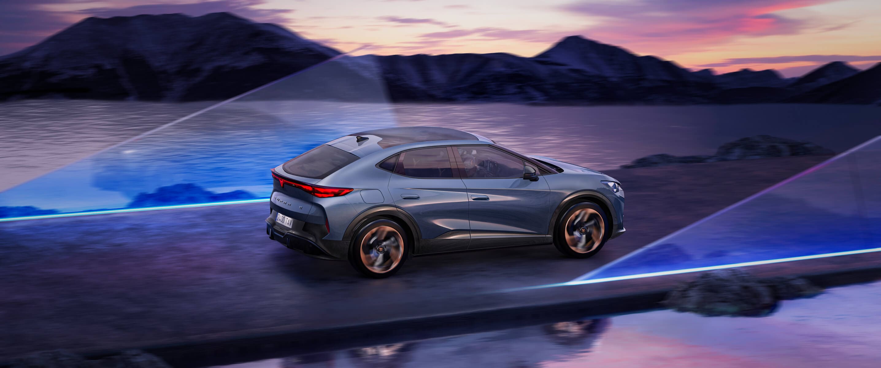 Electric CUPRA Tavascan driving along a scenic coastal road at sunset, with mountain landscape and futuristic light beams, showcasing innovative electric vehicle design.