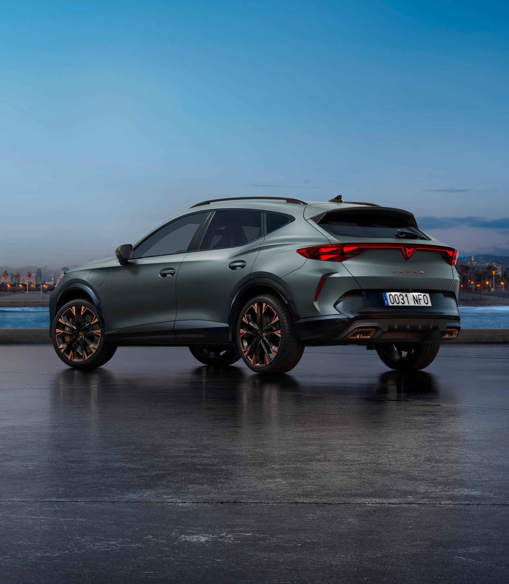 A cupra formentor parked in an outside parking, in the dark with a view of the city in the back.